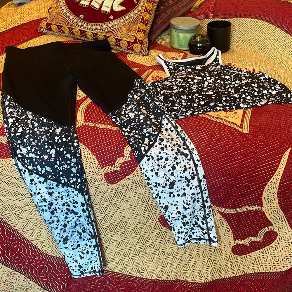 Fabletics black and white athletic wear leggings and bra top set
